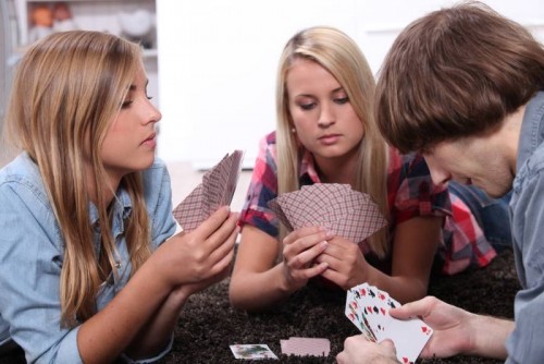 teens playing cards