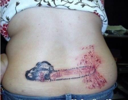 a98541_tattoo-scars_7-chainsaw